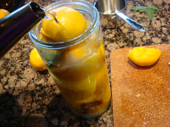 preserved lemons pouring in hot water