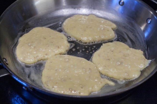 coconut pancakes in griddle