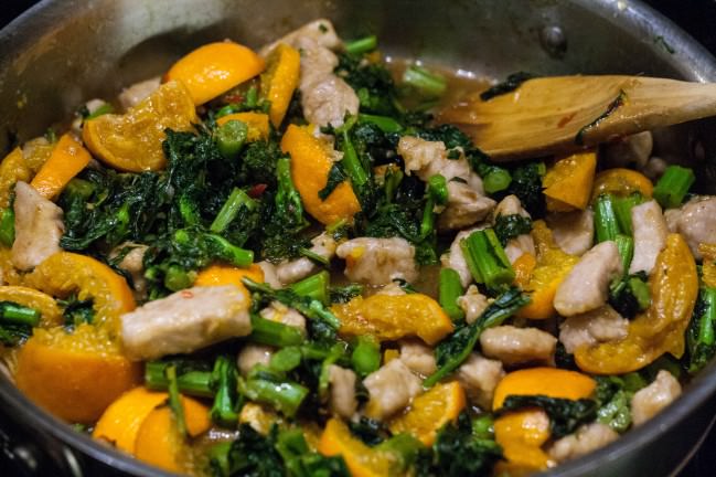 finishing the clementine pork with rapini