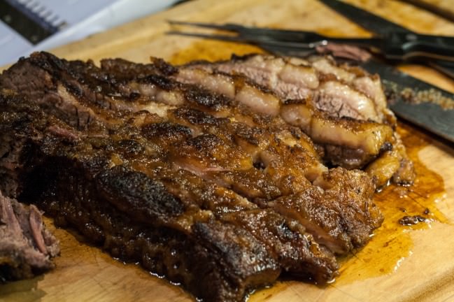 sliced brisket with peach glaze