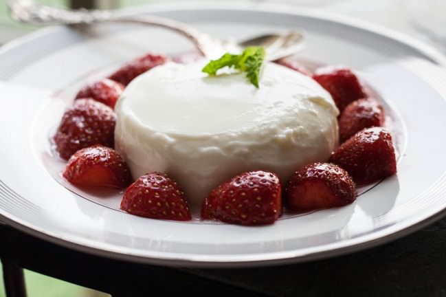 cardamom panna cotta with berries and rose water syrup