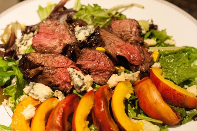 steak salad with grilled peaches