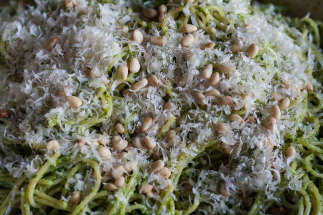 pesto topped with pine nuts and parm