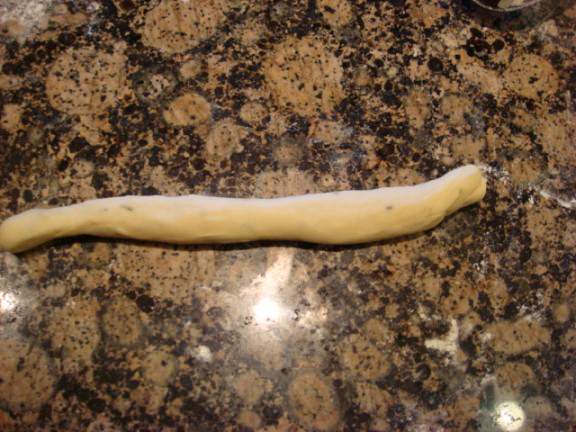 rosemary roll dough rolled into a snake