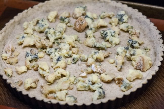 stilton tart baked and scattered with cheese