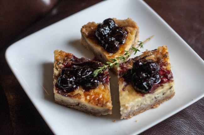 stilton tart with blueberry sage compote aerial