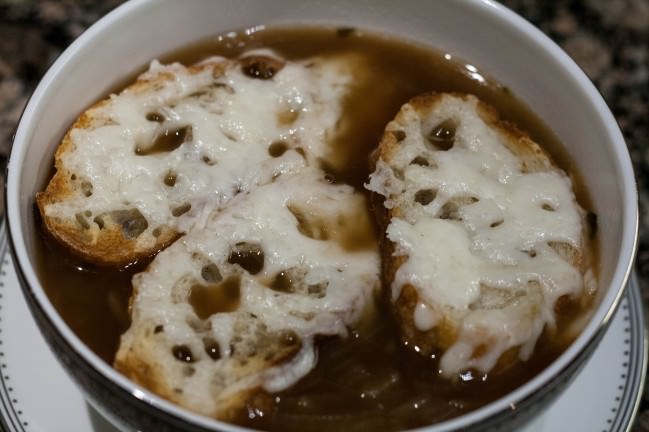 french onion soup with cheesey bread slices