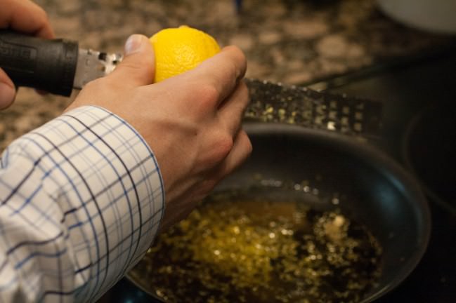 Winter Salad with Green Apples and Golden Beets zesting lemons