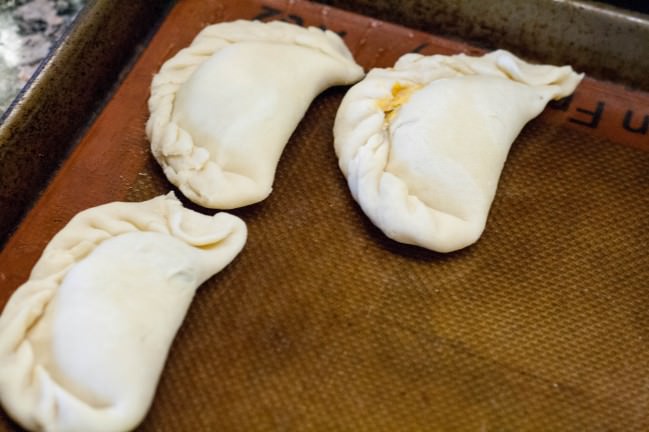 Empanadas with sweet potato, black bean and goat cheese ready for oven
