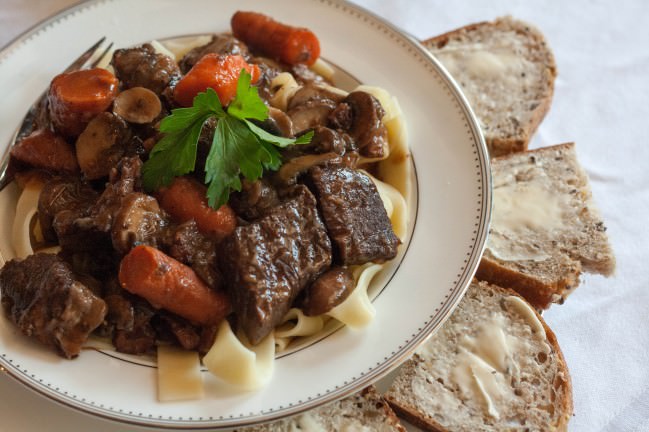 boeuf bourguinon with buttered bread