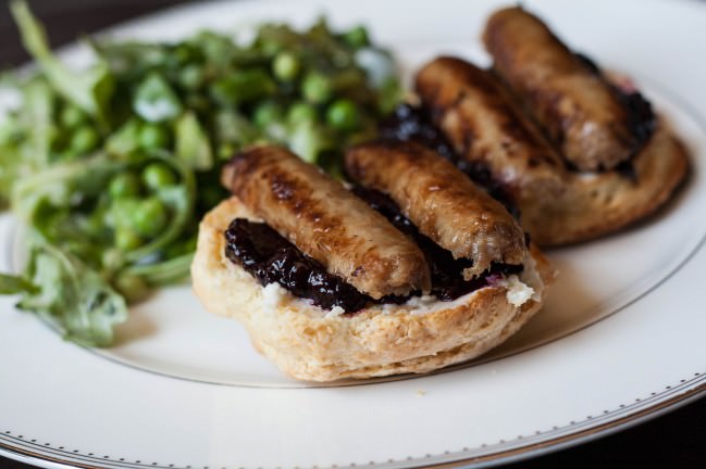 Blue Ridge Mountain Benedicts topped with maple sausage links