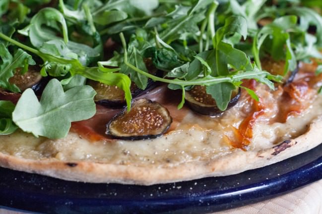 Fig and Prosciutto Pizza with Arugula topped