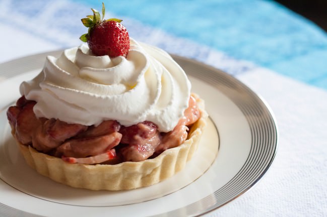 Fresh Strawberry Pie with Rhubarb Curd whip cream garnish