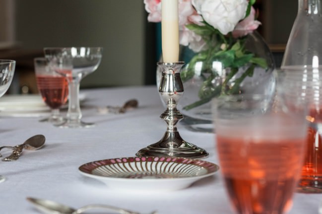 Peony Season Table Setting white striped candles and glasses