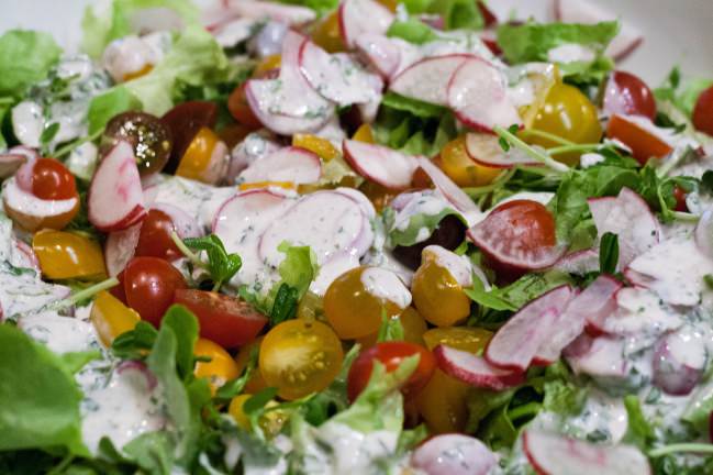 Smoky, Spicy Homemade Buttermilk Dressing on bib lettuce with radishes and jewel tomatoes