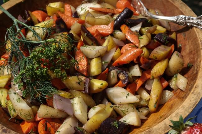 Roasted Rainbow Carrots with a dill frond