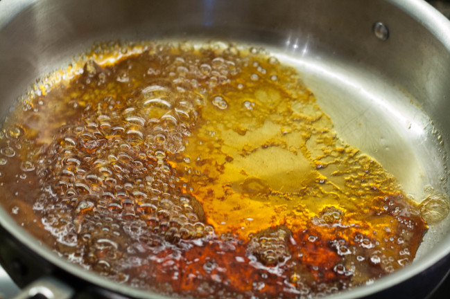 Duckfat Potatoes with Prunes making caramel