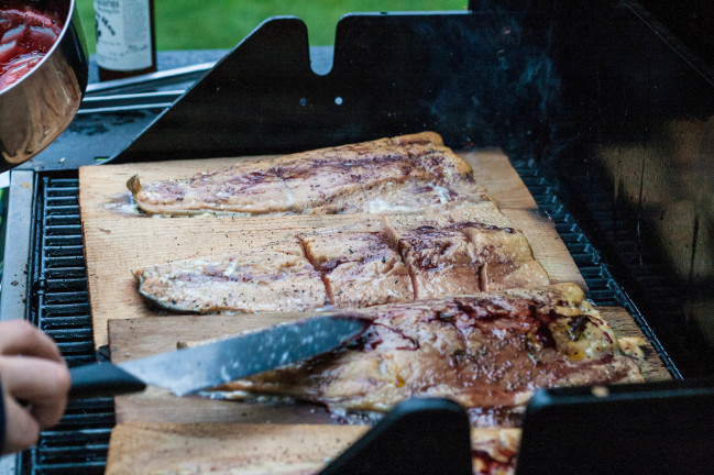 Cedar Plank Salmon with Cherry Glaze adding more glaze