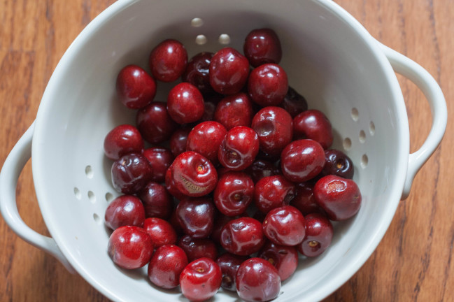 Baked German Cherry Almond Pancakes cherries in colander