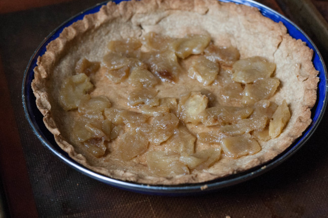Rye Crust Apple Custard Pie crust lined with caramelized apples