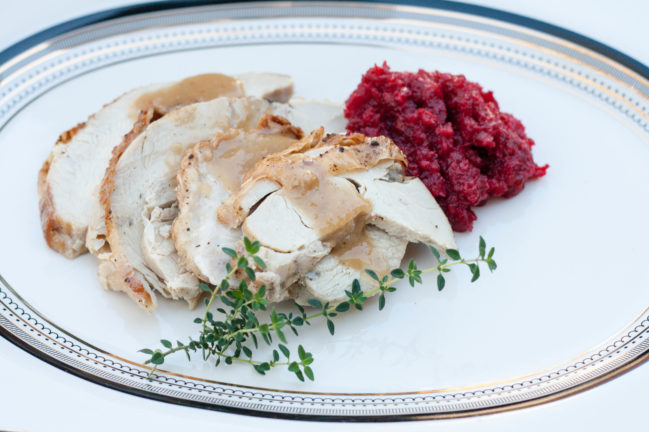 Juniper Brined Turkey Breast Roast sliced with relish